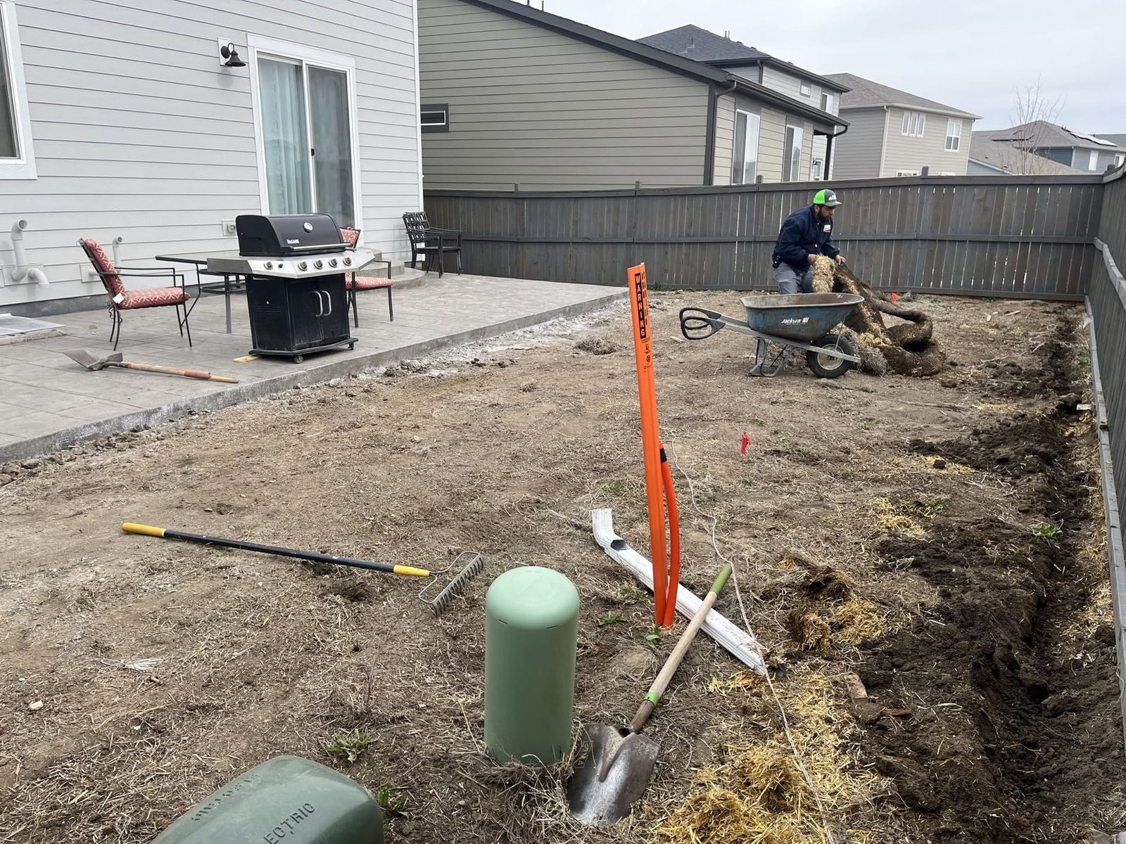 Site clearing and yard preparation before artificial turf